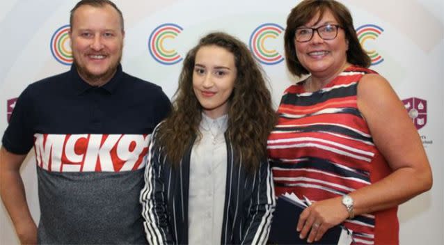 Jess with her parents after recovering to collect her results at St Cuthbert's Catholic High School. Source: St Cuthbert's