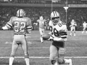 FILE - In this Jan. 4, 1981, file photo, Dallas Cowboys wide receiver Drew Pearson (88) celebrates scoring the winning touchdown in the final minutes against the Atlanta Falcons in an NFC divisional playoff football game in Atlanta. Pearson will be inducted into the Pro Football Hall of Fame on Aug. 8, 2021. (AP Photo/File)