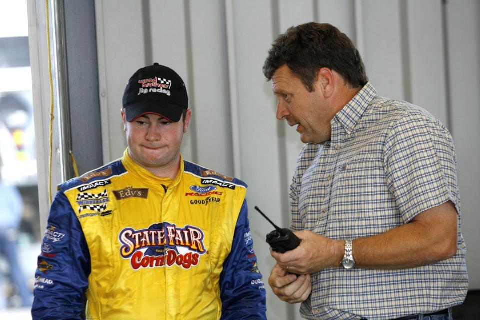 SPARTA, KY - JULY 7: Bobby East, driver of the #21 State Fair Corn Dogs/Edy's Dibs Ford, talks with former series driver Robert Pressley during the NASCAR Craftsman Truck Series Built Ford Tough 225 practice on July 7, 2006 at the Kentucky Speedway in Sparta, Kentucky. (Photo by Joe Robbins/Getty Images for NASCAR)