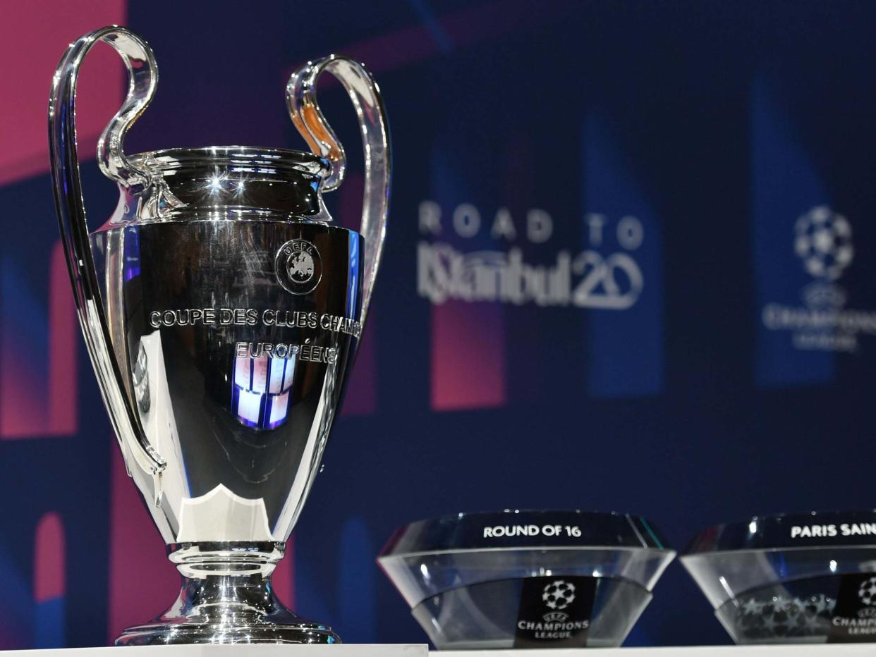 The UEFA Champions League football trophy: AFP via Getty Images