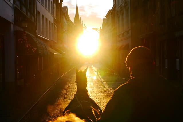 Riding at Dawn in Bruges