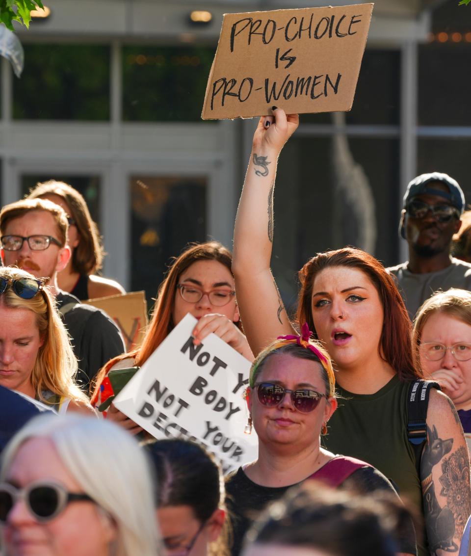 Women, men, and children of all ages protest the Supreme Court's 6-3 decision to overturn the 1973 ruling that legalized abortions Friday at Red Arrow Park in Milwaukee.