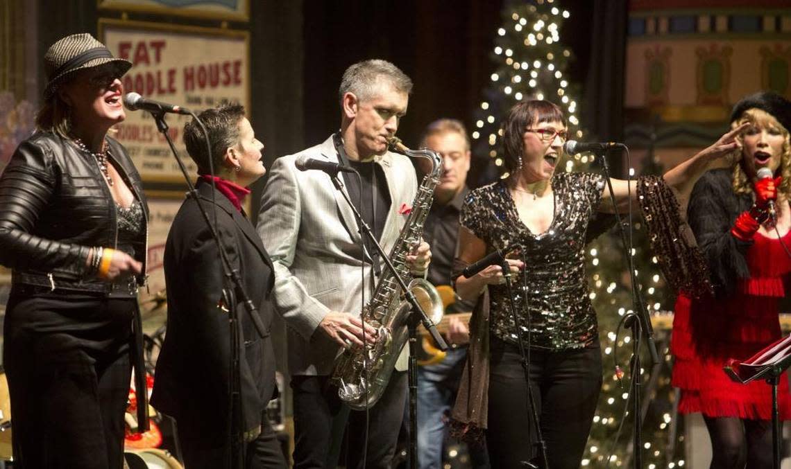 The Divas of Boise, regulars at Xtreme Holiday Xtravaganza, join Curtis Stigers on stage at the Egyptian Theatre.