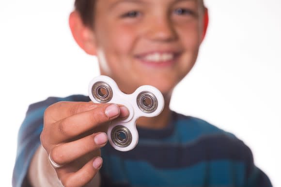 Boy with fidget spinner