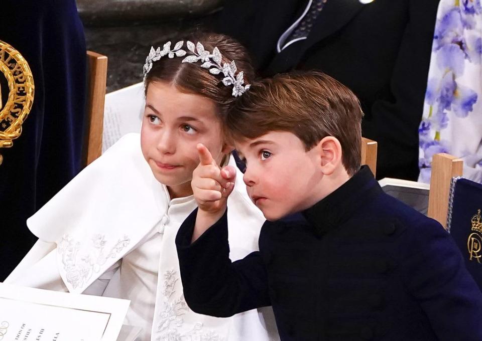 Prince Louis pointing during the service