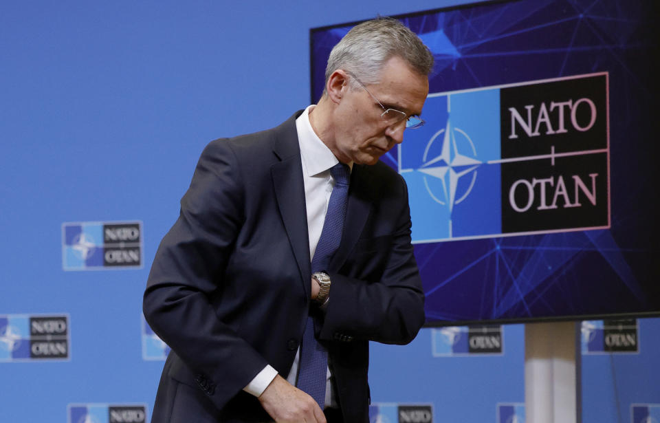 NATO Secretary General Jens Stoltenberg leaves the podium after addressing a media conference after a meeting of the NATO-Ukraine Commission at NATO headquarters in Brussels, Tuesday, Feb. 22, 2022. World leaders are getting over the shock of Russian President Vladimir Putin ordering his forces into separatist regions of Ukraine and they are focusing on producing as forceful a reaction as possible. Germany made the first big move Tuesday and took steps to halt the process of certifying the Nord Stream 2 gas pipeline from Russia. (AP Photo/Olivier Matthys)