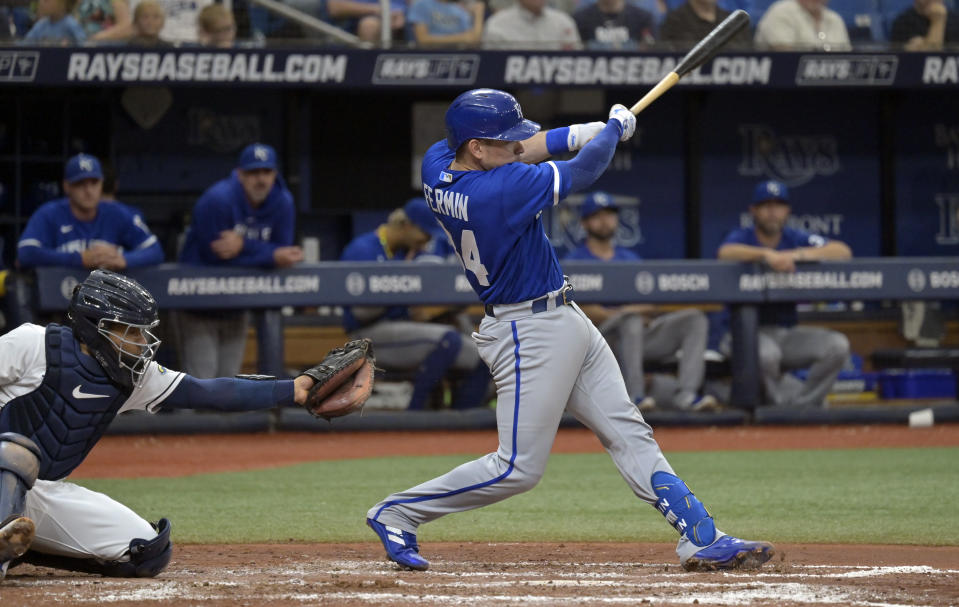 Tampa Bay Rays catcher Francisco Mejia, left, watches as Kansas City Royals' Freddy Frermin hits a three-run home run off Tampa Bay starter Yonny Chirinos during the fourth inning of a baseball game Saturday, June 24, 2023, in St. Petersburg, Fla. (AP Photo/Steve Nesius)