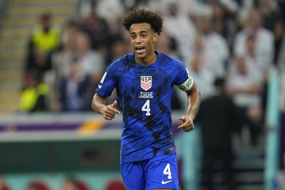 FILE - Tyler Adams of the United States runs on the pitch during the World Cup group B soccer match between England and The United States, at the Al Bayt Stadium in Al Khor , Qatar, on Nov. 25, 2022. Bournemouth midfielder Tyler Adams is progressing toward his return from hamstring surgery and could be named to the squad for Saturday March 9, 2024 Premier League game against Sheffield United. (AP Photo/Julio Cortez, File)