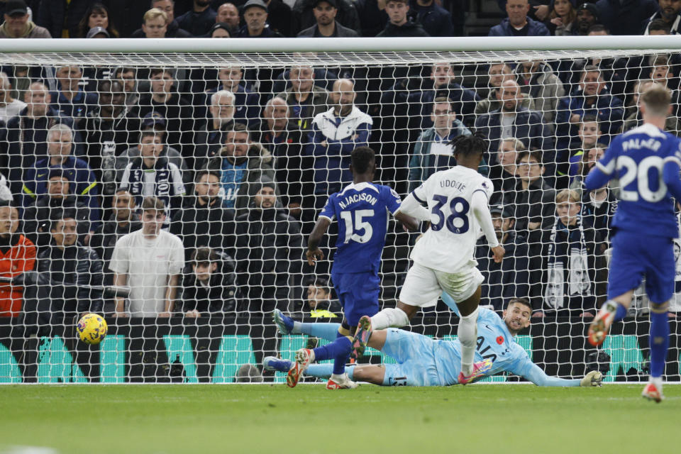 Chelsea's Nicolas Jackson, centre, scores a goal that was later disallowed by a VAR decision during the English Premier League soccer match between Tottenham Hotspur and Chelsea, at Tottenham Hotspur Stadium, London, Monday, Nov. 6, 2023. (AP Photo/David Cliff)