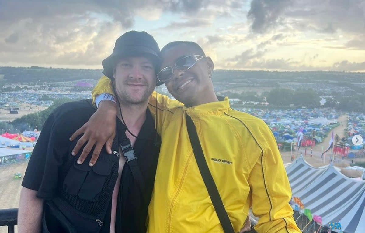 Layton Williams pictured at Glastonbury with his boyfriend (Instagram/Layto Williams)