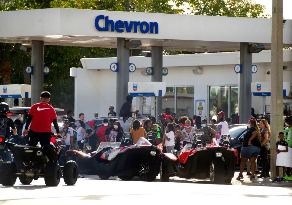 Hundreds of ATV riders, cyclists and others gathered Jan. 1 at a Chevron station in Boynton Beach, Florida, to honor Stanley Davis Jr., a 13-year-old killed in a dirt bike crash in that city a day earlier.