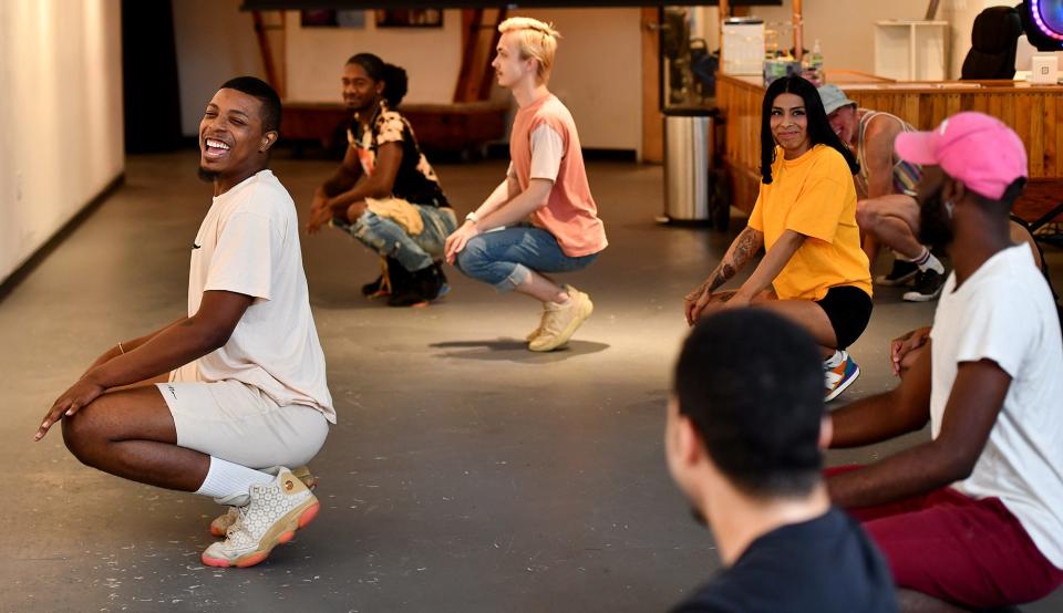 Reality TV star London Fleur De Lis of Springfield teaches the Vogue Worcester class to duckwalk during a recent Worcester PopUp! at the Jean McDonough Arts Center.