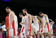 Spain players walk off the court after their loss in the men's basketball quarterfinal game against United States of America at the 2020 Summer Olympics, Tuesday, Aug. 3, 2021, in Saitama, Japan. (AP Photo/Eric Gay)