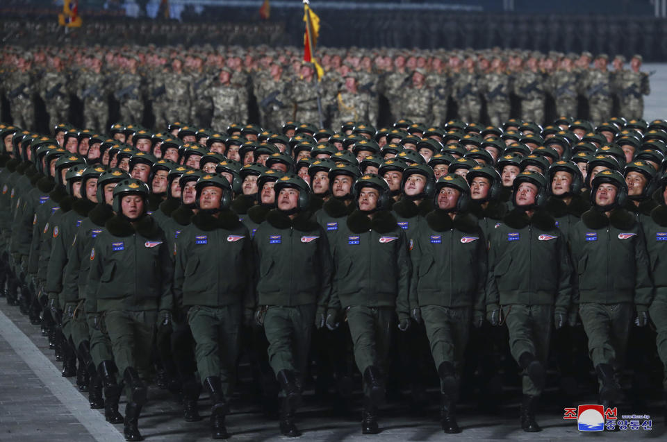 In this photo provided by the North Korean government, North Korean soldiers march in formation during a military parade marking the ruling party congress, at Kim Il Sung Square in Pyongyang, North Korea Thursday, Jan. 14, 2021. North Korea rolled out developmental ballistic missiles designed to be launched from submarines and other military hardware in a parade that punctuated leader Kim Jong Un’s defiant calls to expand his nuclear weapons program. Independent journalists were not given access to cover the event depicted in this image distributed by the North Korean government. The content of this image is as provided and cannot be independently verified. Korean language watermark on image as provided by source reads: "KCNA" which is the abbreviation for Korean Central News Agency. (Korean Central News Agency/Korea News Service via AP)