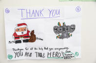 Thank you cards are seen at Rural Fire Service headquarters on Jan. 02, 2020 in Sydney, Australia. (Photo by Jenny Evans/Getty Images)