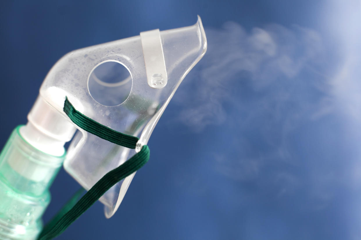 Oxygen inhalation mask for breathing medical treatment.