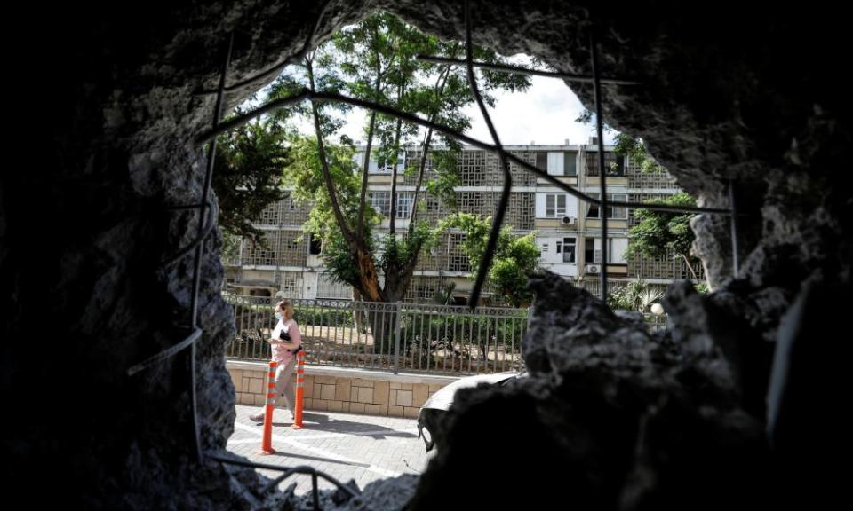 A hole in a wall of a residential building in Ashkelon caused by a rocket launched from Gaza