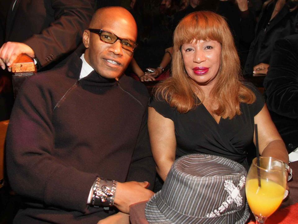 <p>Chris Polk/WireImage</p> Jamie Foxx with his mother Louise Dixon at Crustacean