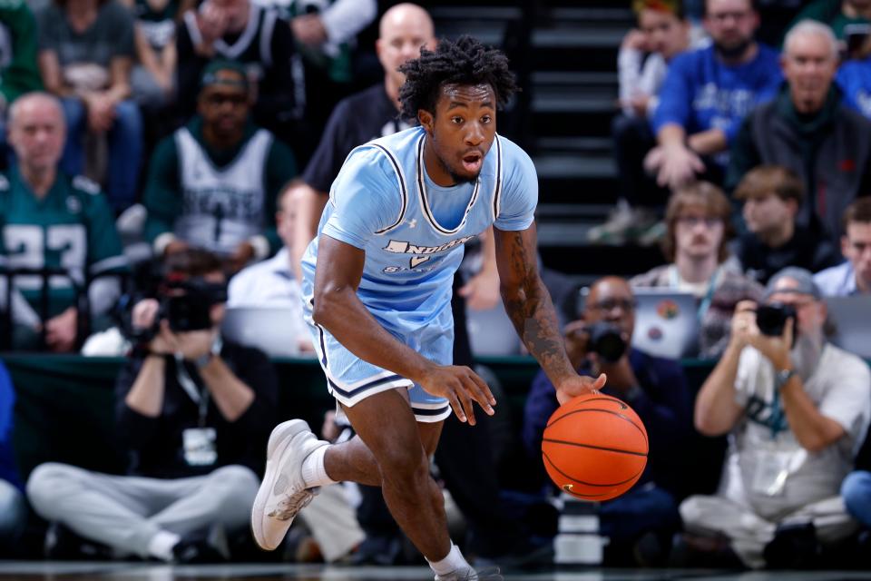 Indiana State guard Isaiah Swope (2) pushes the ball up court after a steal against Michigan State during the first half at Breslin Center in East Lansing on Saturday, Dec. 30, 2023.