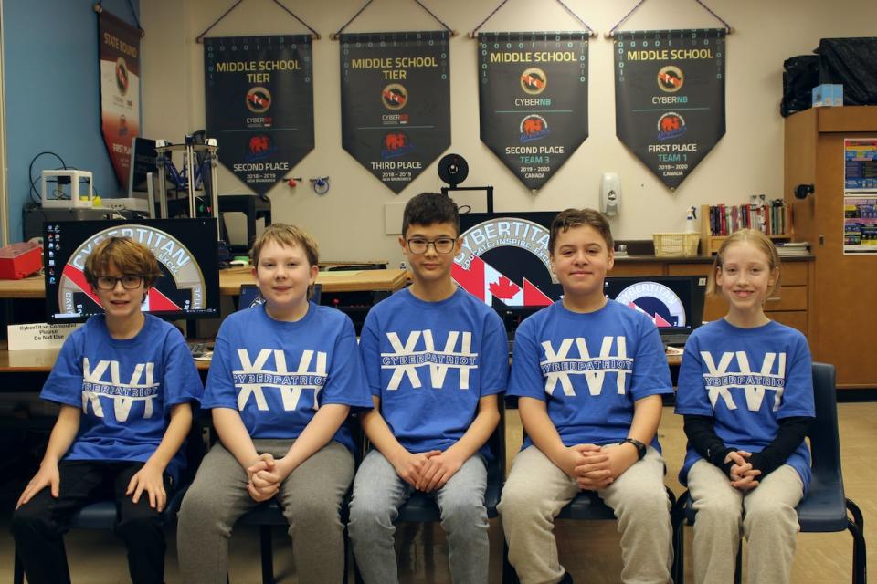 From left, Zach Bangay, Owen Chambers, Simon Jamer, Kyle Dick and Morgan Weatherhead, are all members of the Firewall Fighters, a team of Grade 6 students interested in cybersecurity.