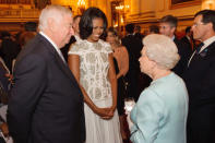 US First Lady Michelle Obama and US Ambassador Louis Susman (L) meets Queen Elizabeth II and US Ambassador Louis Susman during a reception at Buckingham Palace a reception for Heads of State and Government attending the Olympics Opening Ceremony on July 27, 2012 in London, England. (Photo by Dominic Lipinski - WPA Pool/Getty Images)