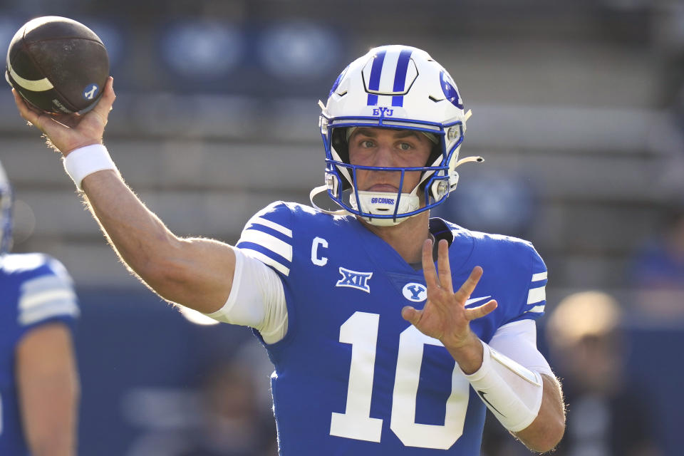 BYU quarterback Kedon Slovis (10) warms up before the start of an NCAA college football game against Texas Tech Saturday, Oct. 21, 2023, in Provo, Utah. (AP Photo/Rick Bowmer)