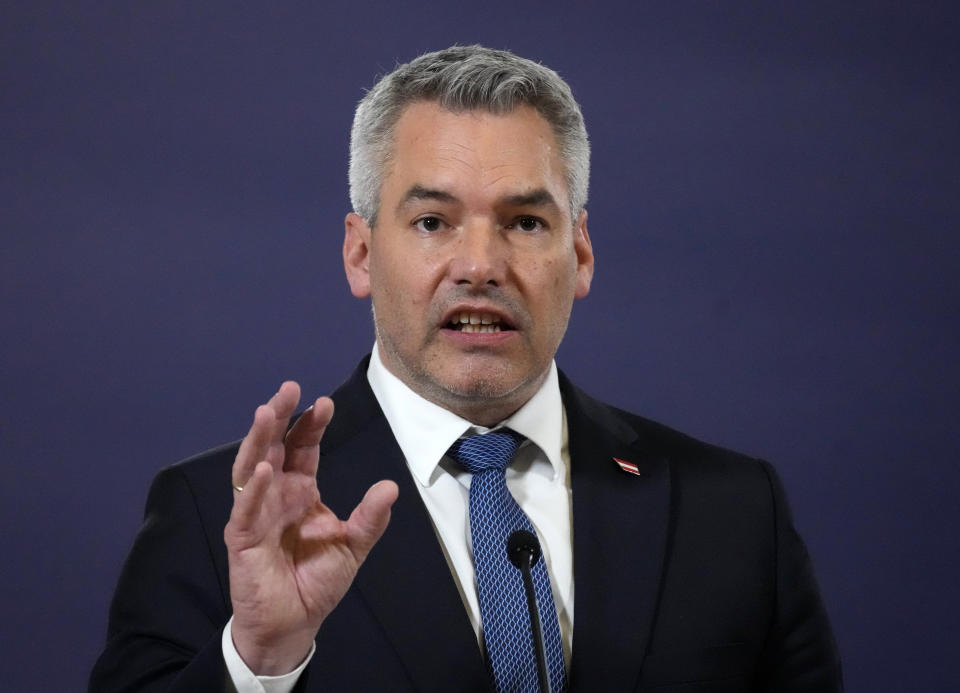 Austria's Chancellor Karl Nehammer speaks during a press conference with Serbian President Aleksandar Vucic and Hungary's Prime Minister Viktor Orban after their trilateral meeting in Belgrade, Serbia, Wednesday, Nov. 16, 2022. (AP Photo/Darko Vojinovic)