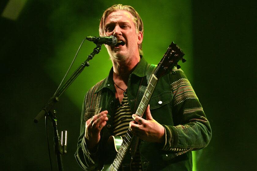 Josh Homme of Queens Of The Stone Age performs at The O2 Arena on November 15, 2023 in London, England.