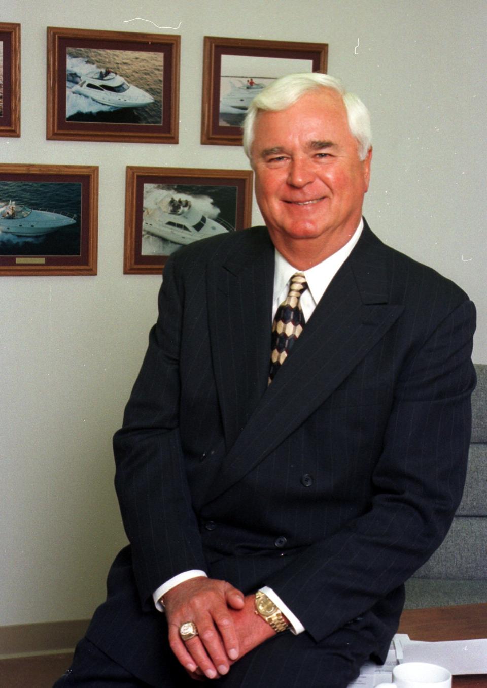 K.C. Stock in his Oconto office in 1999, when he was named Rotary Club of Green Bay's Free Enterprise Award recipient.