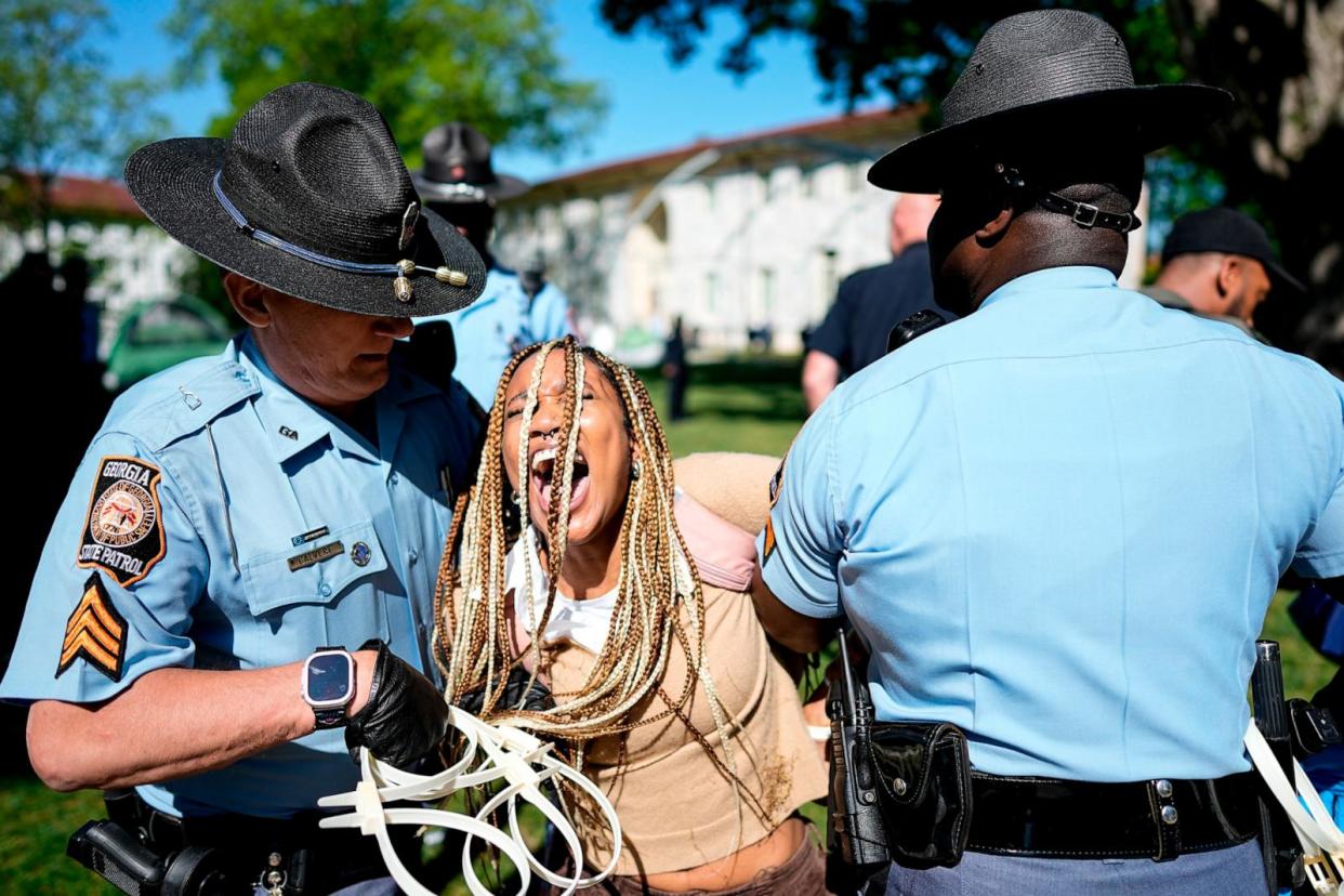 PHOTO: Georgia State Patrol officers detain a demonstrator on the campus of Emory University during a pro-Palestinian demonstration, April 25, 2024, in Atlanta.  (Mike Stewart/AP)