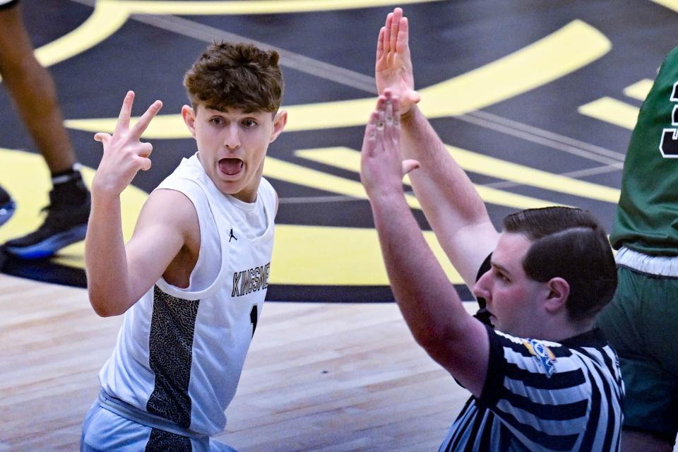 Penn's Joseph Garwood (1) gestures after a three point basket in the first half against Washington Friday, Feb. 10, 2023, at Penn High School.