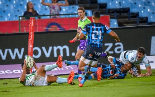 Treble chance: Blues' Stephen Perofeta, one of three playmakers, scores a try against the Bulls at Loftus Versfeld in Pretoria last weekend