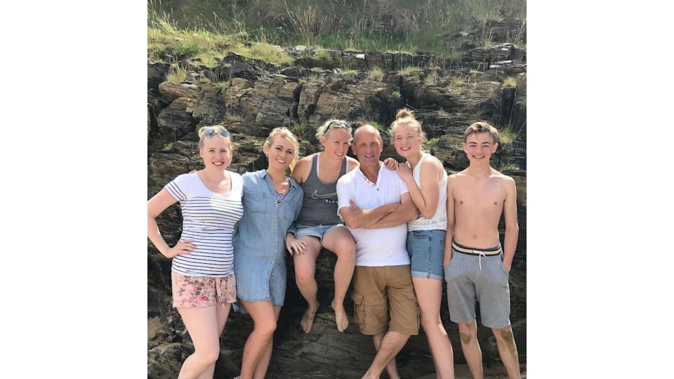 Steve Fletcher with his five children on holiday in Cornwall