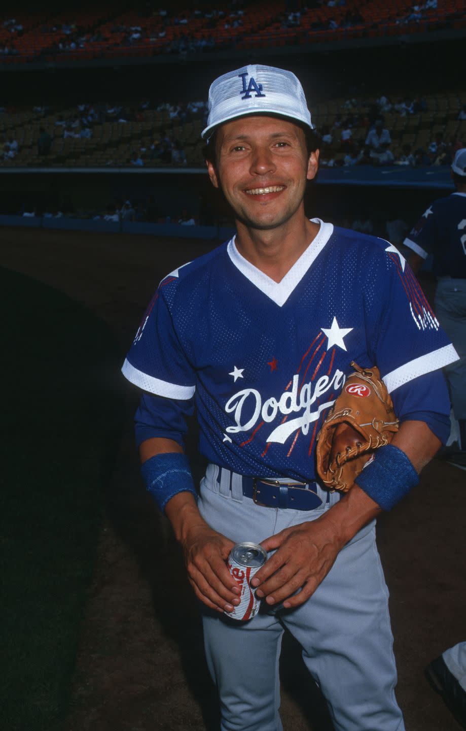 <p>A known baseball fanatic (here he is playing in a celebrity all-star game), Billy Crystal <a href="https://twitter.com/herdbaseball/status/766652200974036994?lang=en" rel="nofollow noopener" target="_blank" data-ylk="slk:attended Marshall University on a baseball scholarship;elm:context_link;itc:0;sec:content-canvas" class="link ">attended Marshall University on a baseball scholarship</a> for one year. His baseball career ended when he had to drop out after his freshman year. </p>