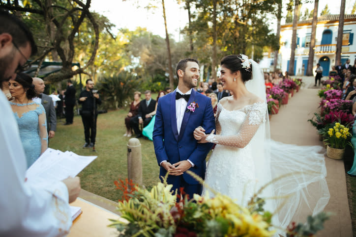 A couple about to get married. Their destination wedding was covered by wedding insurance.