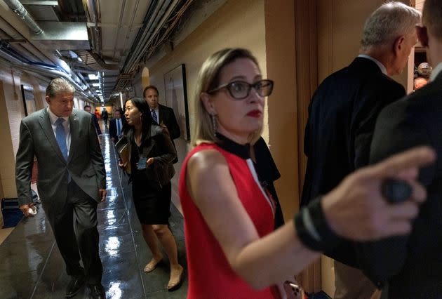 Sens. Kyrsten Sinema (D-Ariz.) and Joe Manchin (D-W.Va.), on their way to a July Capitol Hill meeting, have said they will not vote for the Build Back Better legislation if it envisions $3.5 trillion in new federal spending over 10 years. (Photo: Kevin Dietsch via Getty Images)