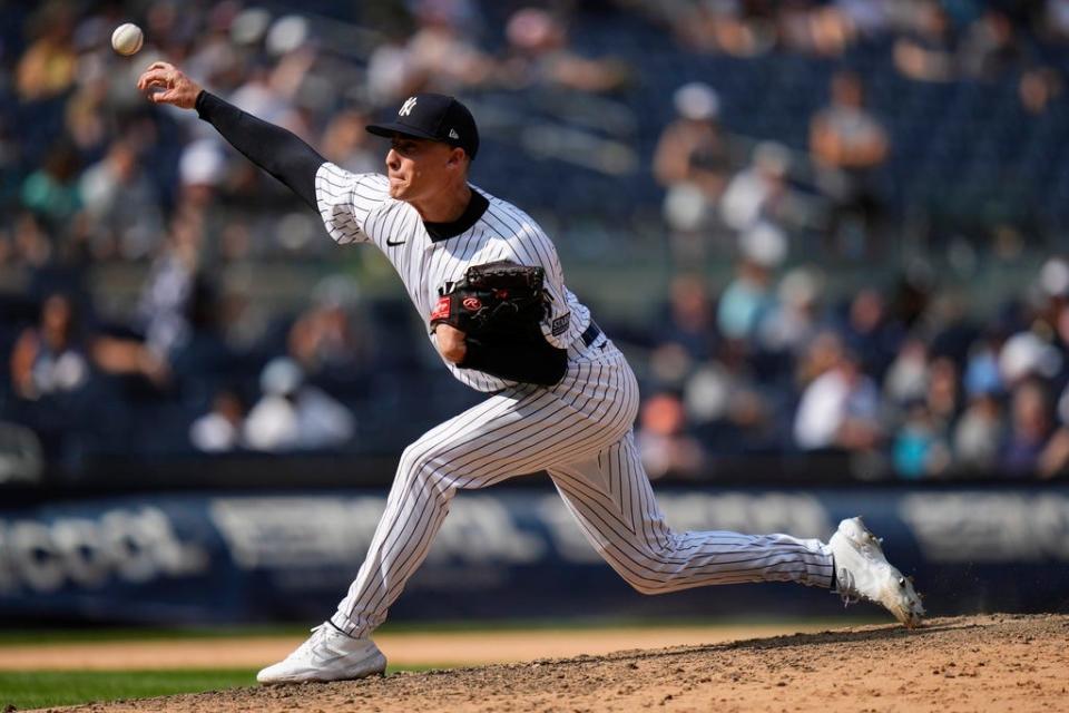 New York Yankees pitcher Ron Marinaccio throws during the ninth inning of a baseball game against the Kansas City Royals, Sunday, July 23, 2023, in New York.