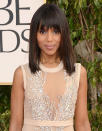 "Django Unchained" actress Kerry Washington dazzled in a nude semi-sheer Miu Miu dress when she hit the red carpet for the 2013 Golden Globe Awards. Sure, the dress was gorgeous, but what really made the look work was her super-straight tresses with bangs.