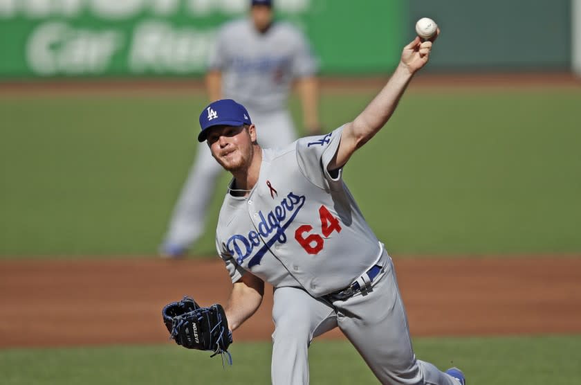 Los Angeles Dodgers pitcher Caleb Ferguson works against the San Francisco Giants during the first inning of the second game of a baseball doubleheader Thursday, Aug. 27, 2020, in San Francisco. (AP Photo/Ben Margot)