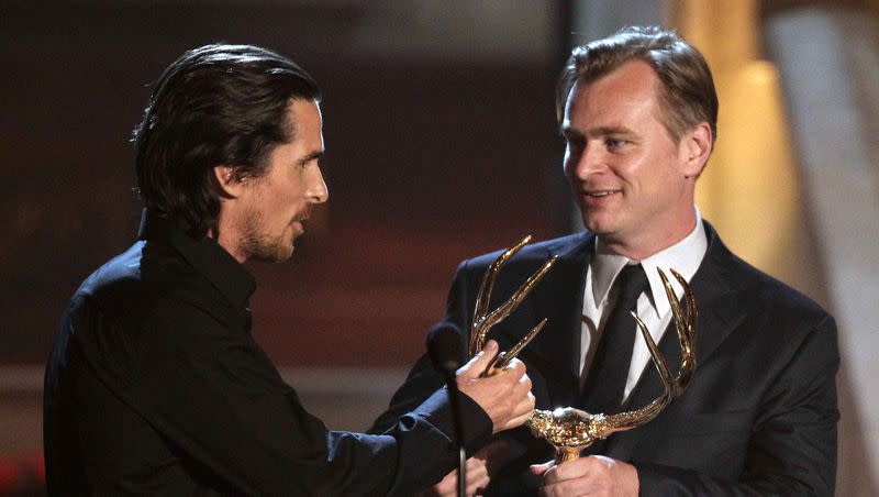 Christian Bale, left, and Christopher Nolan walk onstage to accept the “Most Manticipated” movie award for “The Dark Knight Rises” at the 2012 Guys Choice Awards on Saturday, June 2, 2012, in Culver City, Calif.
