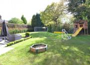 <p>The garden comes complete with goalposts (Image: Rightmove). </p>