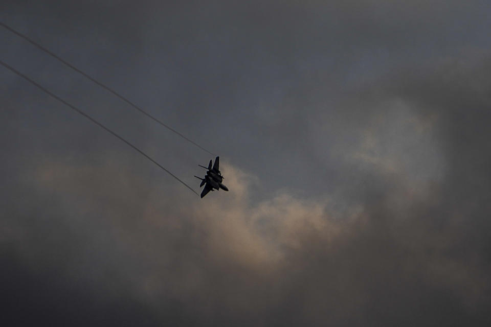 An Israeli Air Force F-15 jet fighter maneuvers over northern Israel on the border with Lebanon, Tuesday, Feb. 27, 2024. The Israeli military on Tuesday struck southern Lebanon with airstrikes, including what a Lebanese security official in the area described as an important Hezbollah headquarters near the coastal city of Sidon. (AP Photo/Ariel Schalit)