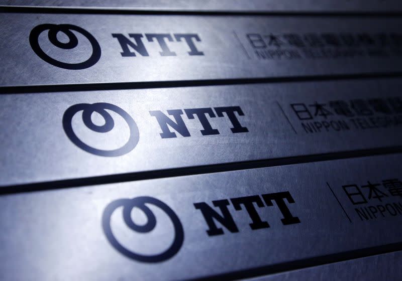 The logos of NTT are displayed at a building in Tokyo