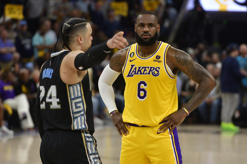 Memphis Grizzlies forward Dillon Brooks (24) talks to Los Angeles Lakers forward LeBron James (6) during the second half of Game 2 in a first-round NBA basketball playoff series Wednesday, April 19, 2023, in Memphis, Tenn. (AP Photo/Brandon Dill)