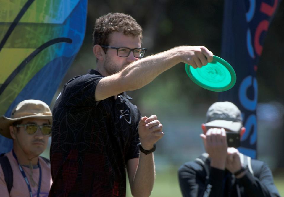 A disc golfer takes aim from the 7th tee during the OTB Open Disc Golf Pro Tour at the Swenson Golf Course in Stockton. 