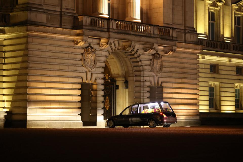 The hearse carrying the coffin of Queen Elizabeth II arrives at Buckingham Palace (PA Wire)