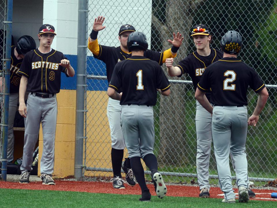 Tri-Valley celebrates after scoring in the sixth inning against Philo on April 25 in Duncan Falls. The game was suspended in the bottom of the 7th tied at 4 due to rain. Tri-Valley earned the No. 2 seed in the East District sectional tournament drawing.