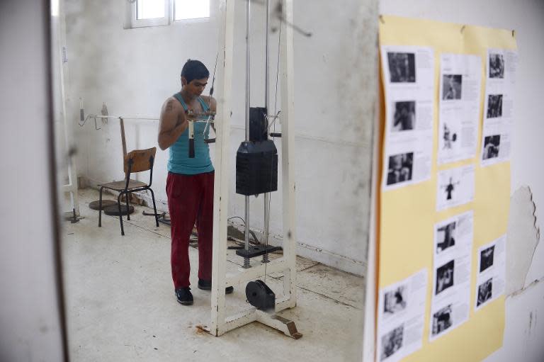 An inmate uses an exercise machine at the gym of Boychinovtsi Correctional Home, in north-west Bulgaria