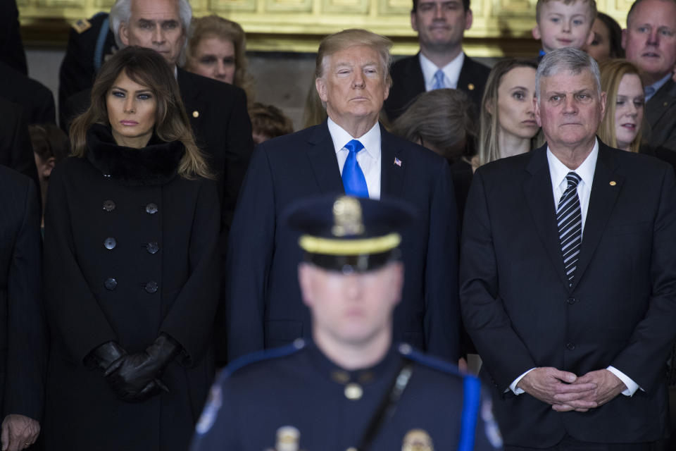 President Donald Trump, first lady Melania Trump and Franklin Graham attend a ceremony in the Capitol Rotunda as the late Rev. Billy Graham, the father of Franklin, lies in honor on Feb. 28, 2018. (Photo: Tom Williams via Getty Images)