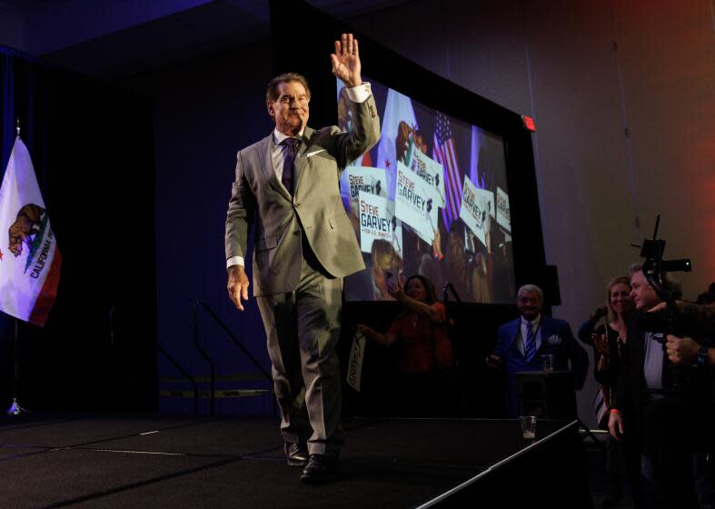 PALM DESERT, CA - MARCH 5, 2024: Republican U.S. Senate candidate Steve Garvey waves to his supporters after speaking at his election night party on March 5, 2024 at the JW Marriott Desert Springs in Palm Desert, California.(Gina Ferazzi / Los Angeles Times)